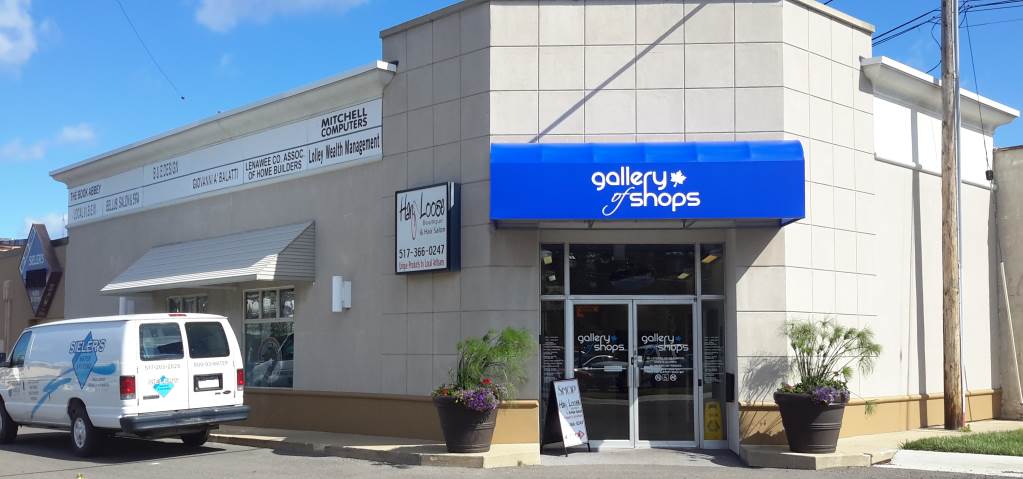 Gallery of Shops parking lot entrance off Church St in downtown Adrian MI